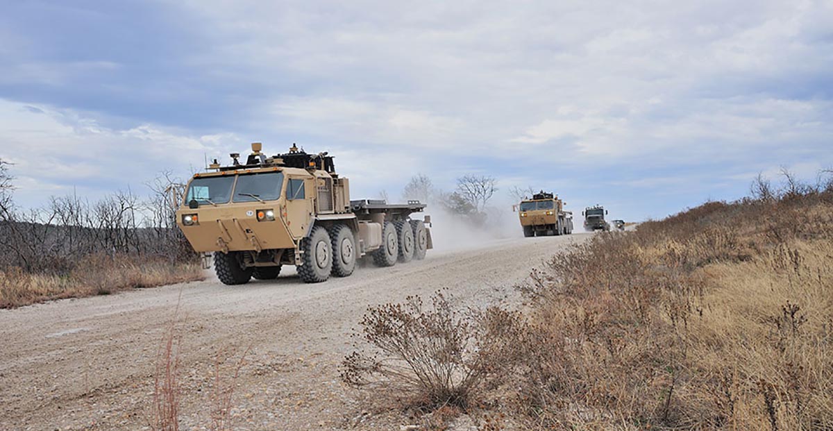 A convoy of autonomous military vehicles using Lockheed’s AMAS system take part in a demonstration. Photo: Lockheed Martin