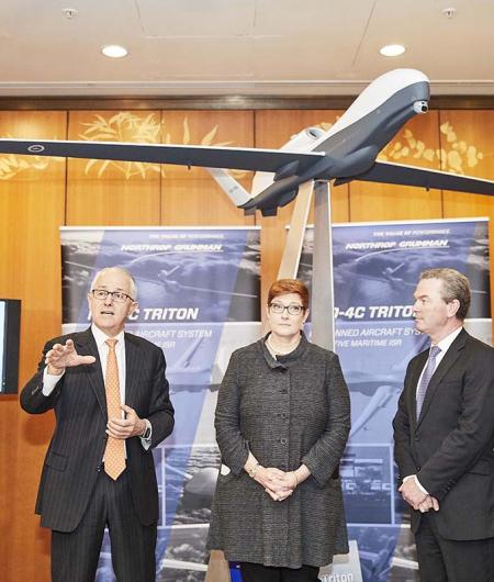 Northrop Grumman and Australian officials at a ceremony marking a Triton sale. Photo: Northrop Grumman