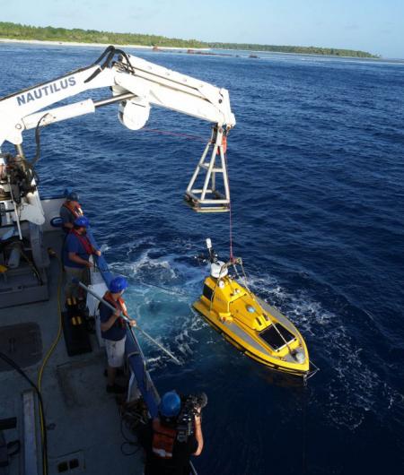 An unmanned surface vessel prepares to launch from the EV Nautilus. Photo: Ocean Exploration Trust