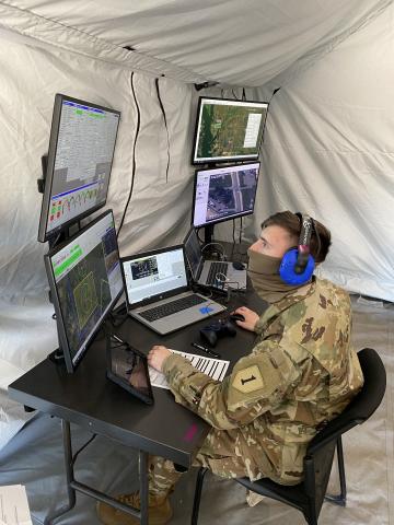 Spc. Nicholas Miller conducts flight operations through a laptop-based ground control station during the FTUAS capabilities assessment at Fort Riley, Kansas, April 8. Photo: Program Executive Office Aviation Spc. Nicholas Miller conducts flight operations through a laptop-based ground control station during the FTUAS capabilities assessment at Fort Riley, Kansas, April 8. Photo: Program Executive Office Aviation