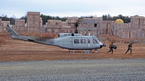 Marines load supplies for the Autonomous UH-1H during a Dec. 13 demonstration. Photo courtesy of Aurora Flight Sciences.