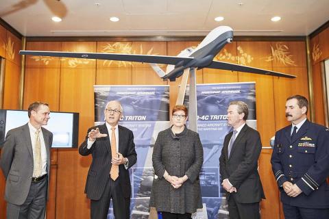 Northrop Grumman and Australian officials at a ceremony marking a Triton sale. Photo: Northrop Grumman