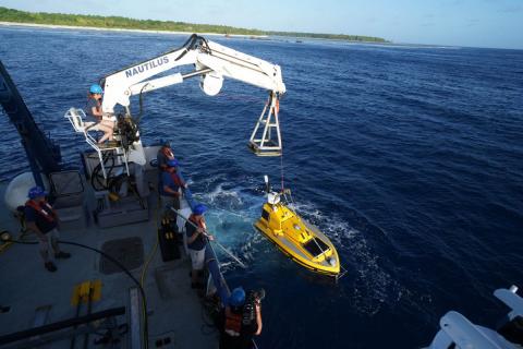 An unmanned surface vessel prepares to launch from the EV Nautilus. Photo: Ocean Exploration Trust An unmanned surface vessel prepares to launch from the EV Nautilus. Photo: Ocean Exploration Trust