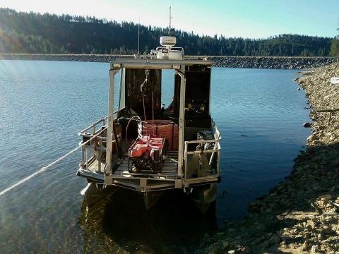 The ROV loaded onto the boat and ready for action, photo credit: Craig Bussel.