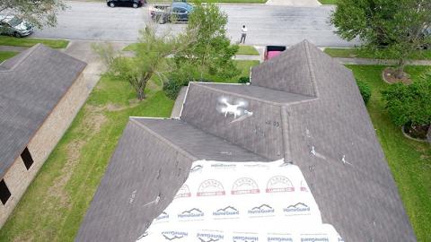 Geomni has announced a new service that allows customers to dispatch a licensed, qualified UAV pilot to collect imagery and data about a structure. (Photo by Geomni)