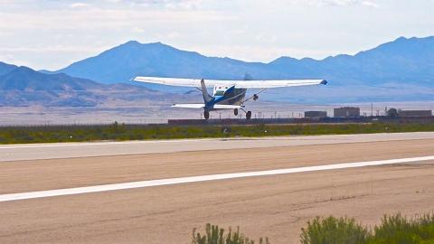 A ROBOpilot controlled 1968 Cessna 206 taking off during it’s first flight at Dugway Proving Ground, Utah. Photo: Air Force Research Laboratory