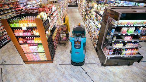 The Tennant T380AMR robotic scrubber operating in a store. Photo: Brain Corp